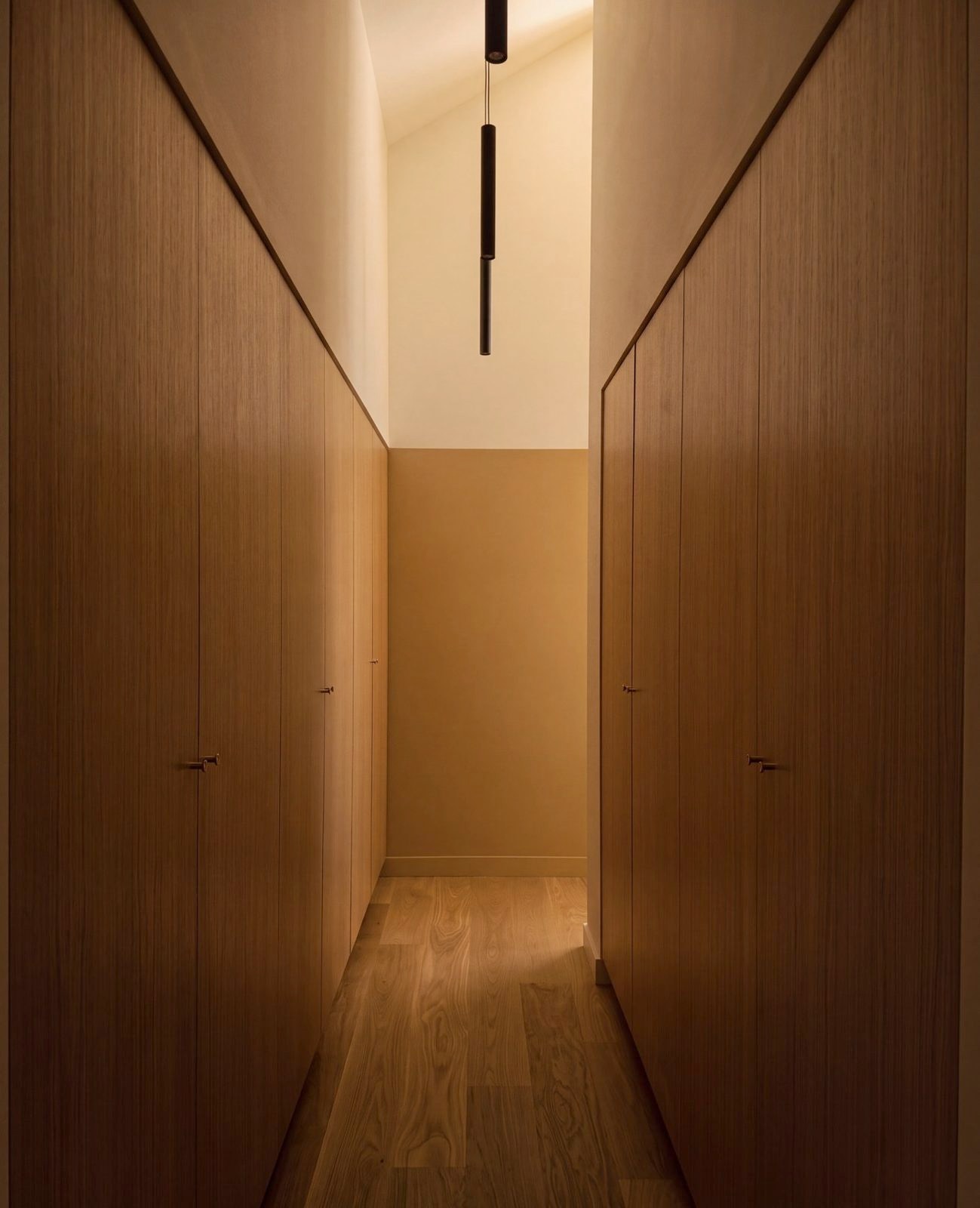 Oak doors along a corridor, flush and unframed