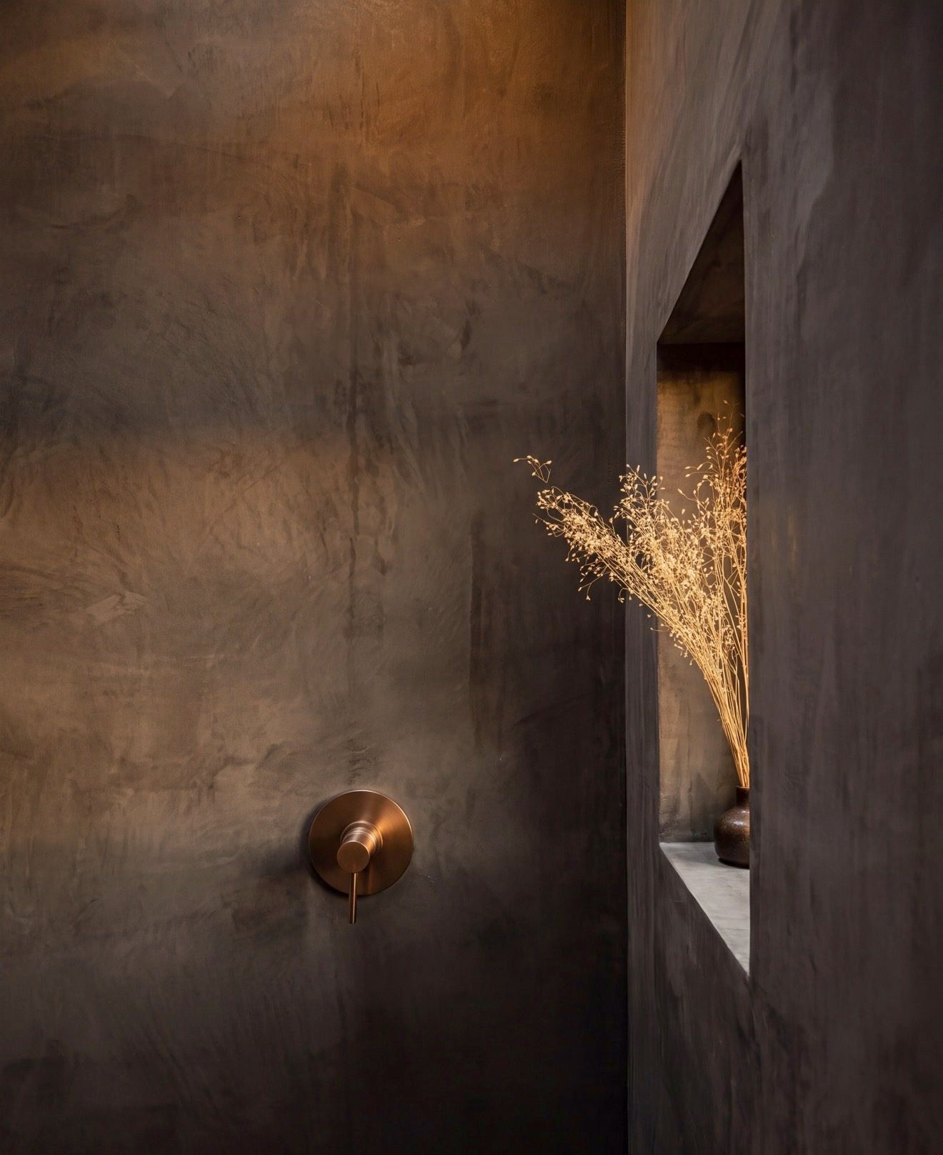 Lime plaster, timber and a niche with dried flowers